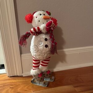 Charming Snowman Skater with Red and White Accents